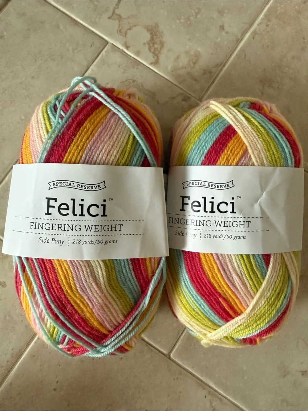 Felici Fingering Weight Yarn - Multicolor Pastel Stripes 2 Skeins Side Pony